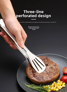 Macro detail of 304 stainless steel food tongs gripping a steak with hollowed spatula design