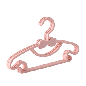 Pink bow plastic children's hangers with non-slip notches on white background