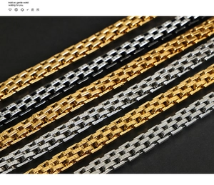 Detailed macro view of gold, silver, and black titanium steel watchband style bracelets