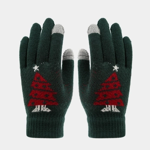 Close-up of green knit gloves with red Christmas tree pattern and touchscreen fingertips