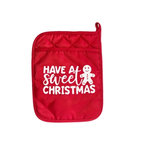 Red quilted Christmas pot holder with Have a Sweet Christmas gingerbread man print