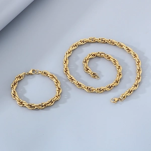 Macro shot of 18k gold plated stainless steel twisted rope necklace and bracelet set