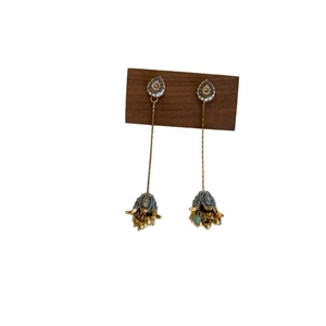 Vintage gold drop earrings with diamond floral design and long tassels in retro style