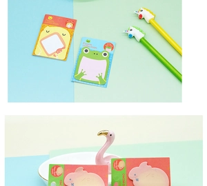 Close-up of cute animal-shaped sticky notes with colorful cartoon unicorn pens