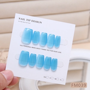 Handmade blue gradient cat-eye press-on nails set on white display card for women