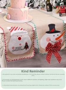 Linen Christmas table runner with Santa and Snowman embroidery on a decorated table
