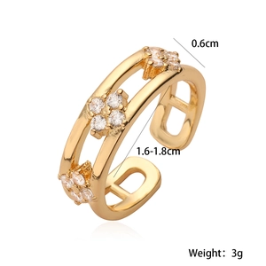 Adjustable 18K gold plated ring featuring dainty daisy-shaped cubic zirconia clusters