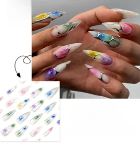 Detailed view of long stiletto press-on nails with silver flame lines and gradient tint