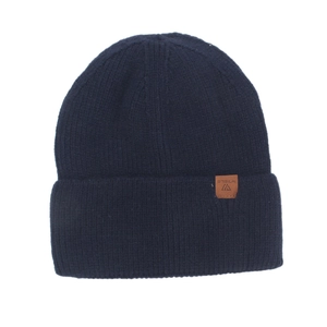 Detailed view of dark blue ribbed knit beanie with brown leather logo patch