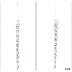 Macro detail of twisted acrylic Christmas icicle pendants with clear hanging strings