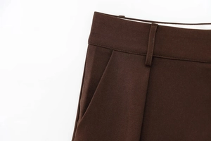 Close-up of high-density twill dress pants waist with belt loops and side pockets