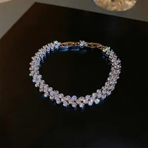 Elegant multi-row wave bracelet with sparkling zircons in a silver-toned finish