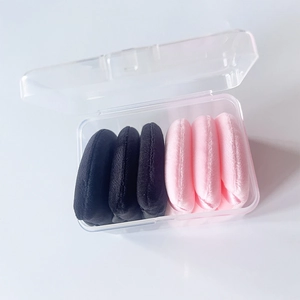 Set of 6 velvet makeup sponges in black and pink within a transparent storage box