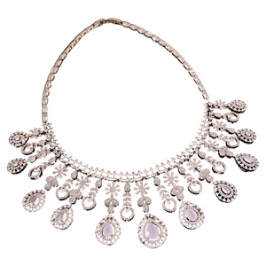 Zircon flower necklace with pink teardrop crystal pendants on white background