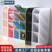 Close-up of a four-slot slanted desk organizer for pens in multiple pastel colors