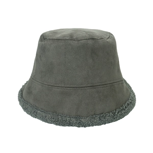 Detail of gray faux suede bucket hat with warm lamb wool trim and soft matte texture