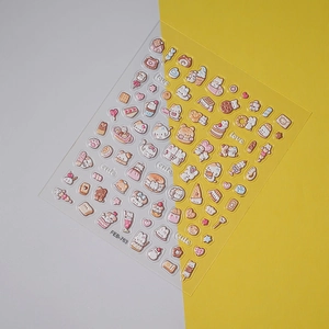 Macro view of 5D embossed nail art stickers featuring cute cartoon bears and rabbits