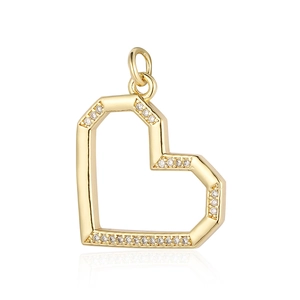 Detailed view of heart lock charm with copper zircon and engraved gold finish