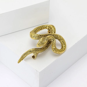 Vintage gold enamel python snake brooch on white geometric base for suits and coats