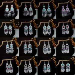 Detailed grid showing colorful bohemian feather earrings with silver alloy and beads