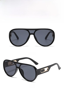 Oversized black aviator sunglasses with gold temple accents in front and side views