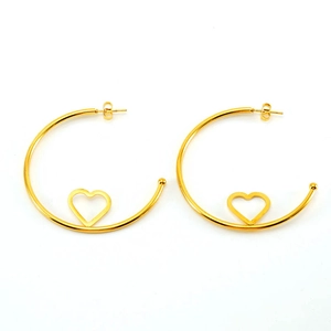 Minimalist gold stainless steel hoop earrings with hollow heart charms on white background
