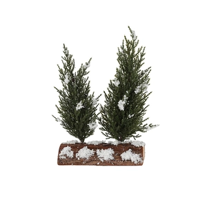 Miniature double snow-flocked Christmas trees on a natural wooden base for tabletop decor