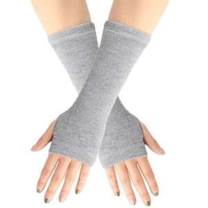 Detail of light gray knitted arm sleeves with fingerless design and soft ribbed texture