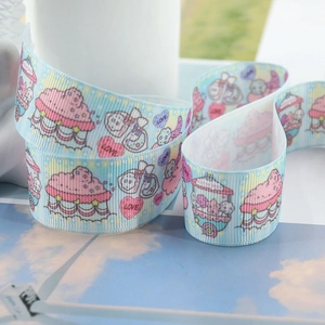 Light blue polyester grosgrain ribbon with kawaii pink dessert and cartoon prints