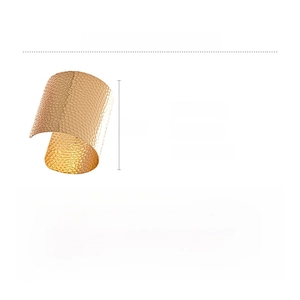 Detail showing the 6cm height and hammered texture of this golden iron cuff bracelet