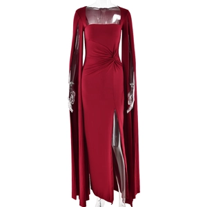 Detail of square neckline and pleated waist on deep red high-slit floor-length dress