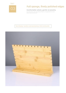 Detail view of the bamboo jewelry display board showing the back support and wood texture