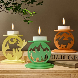 DIY forest candle holder mold set featuring pine trees and bear silhouettes in nature