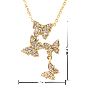 Detailed view of gold butterfly pendant with cubic zirconia showing 32mm and 19mm size specs
