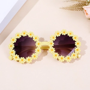 Cute round flower petal sunglasses for kids featuring yellow daisies and gradient lenses