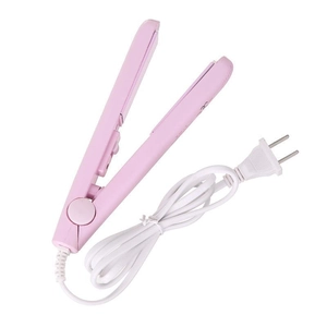 Pink mini hair straightener and curler for home use with compact design and power cord