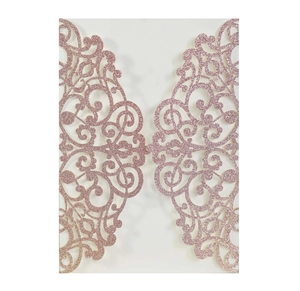 Macro detail of laser-cut wedding invitation cover in pink glitter cardstock