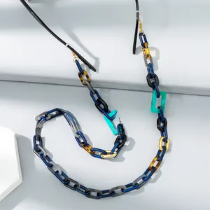 Detail of colorful acrylic glasses chain with geometric links and anti-slip silicone ends