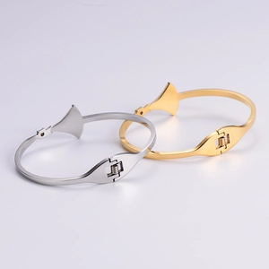Polished stainless steel skirt-shaped bangle set with white shell inlay in gold and silver