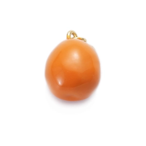 Detailed view of an orange fruit-shaped resin charm with a gold metal ring loop