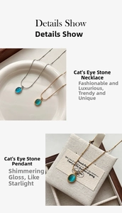 Detail view of blue-green oval opal pendants with gold and silver bead chains