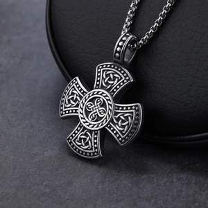 Vintage Celtic cross pendant in stainless steel with intricate knotwork on a box chain