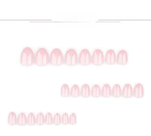 Detailed view of short round pink French press-on nail set with white tips and glossy finish
