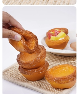 Soft slow rebound artificial egg tart toy with realistic strawberry and mango toppings