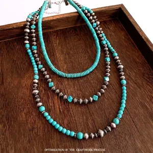 Vintage irregular stone beaded triple-layered necklace with turquoise and silver beads