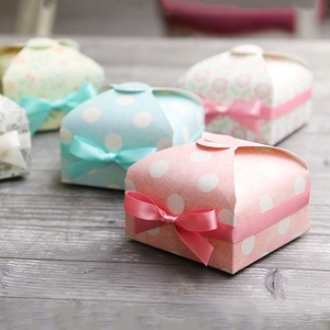 Mini vintage square paper cake boxes with ribbon bows in floral and polka dot patterns