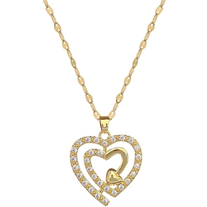 Three-layer titanium steel heart necklace with brilliant crystals on a gold chain