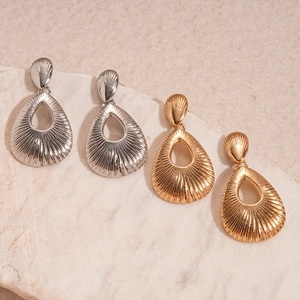 Minimalist metallic waterdrop earrings with shell texture in gold and silver