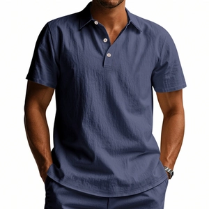 Close-up of navy linen texture on men's short sleeve polo shirt and matching trousers