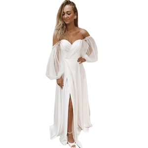 Elegant white strapless wedding dress with pearl puff sleeves and high slit skirt